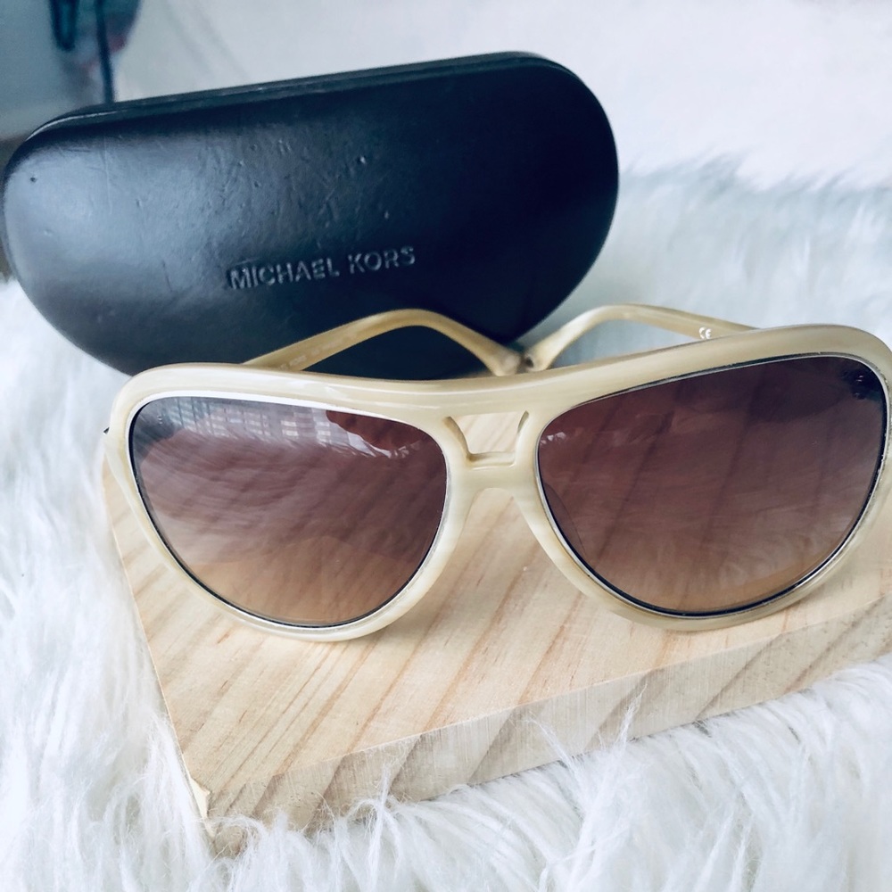 Michael Kors sunglasses.